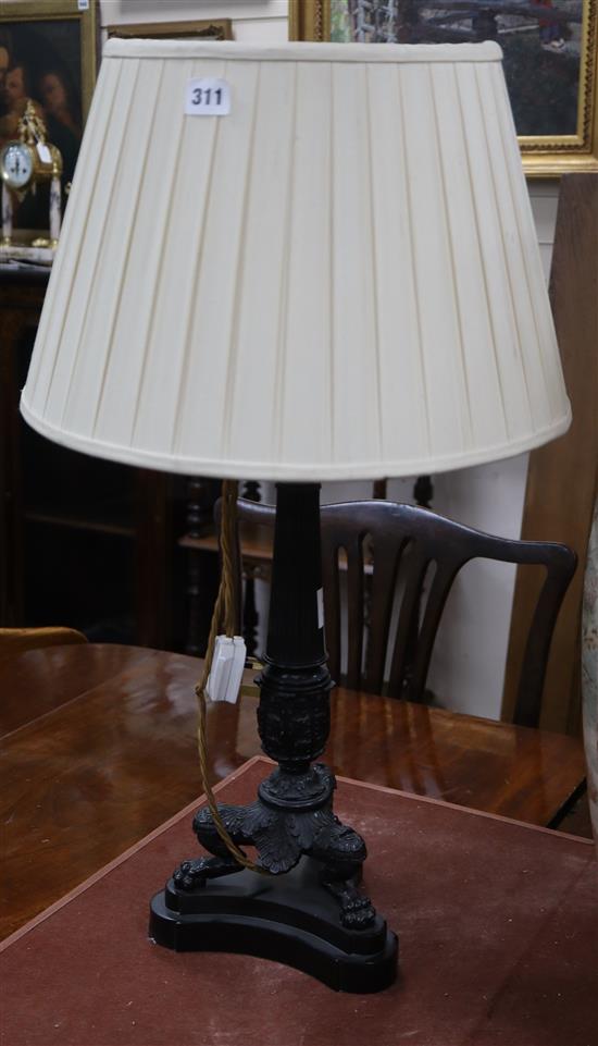 A pair of Regency style bronze table lamps